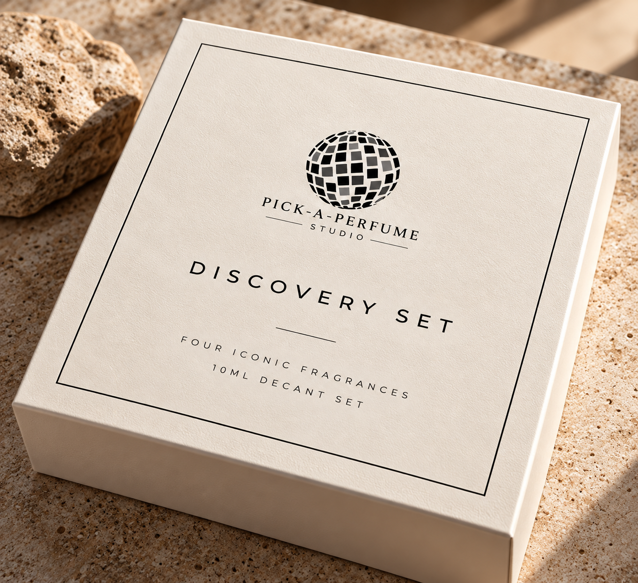 Pick-a-Perfume Studio Discovery Set — closed cream presentation box